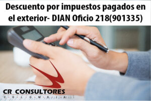 Descuento por impuestos pagados en el exterior- DIAN Oficio 218(901335)